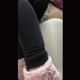 In this voyeuristic video, a heavily tattooed girl takes a shit while sitting on a toilet. Pooping sounds are clearly heard. Over 7 minutes.